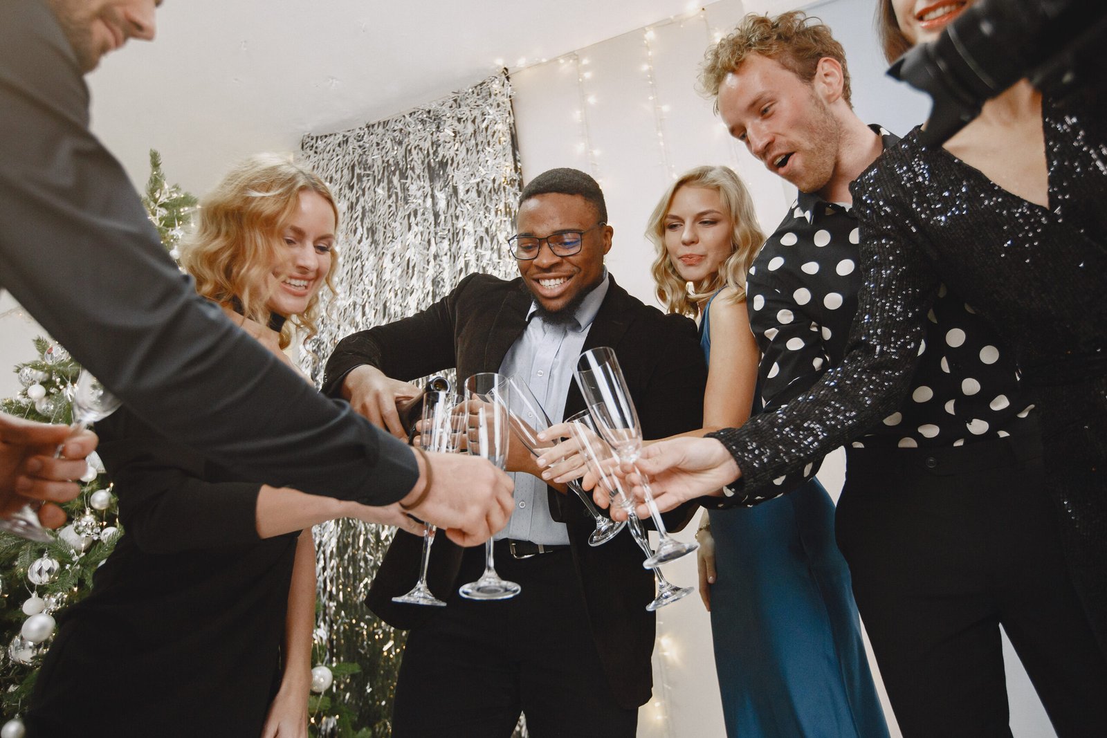 International people having fun in a party decorated room